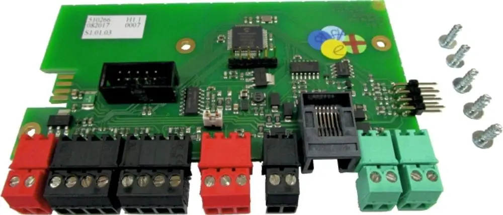 Schaltungsträger mit mehreren Anschlussklemmen und einem Mikrochip, möglicherweise für die Verwendung in Wolf-Produkten. Neben Schrauben sichtbar.